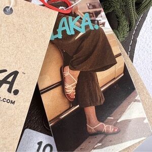 PLAKA PALM LEAF FLAT SOLE SANDALS. SIZE 10. High quality rubber soles, nylon